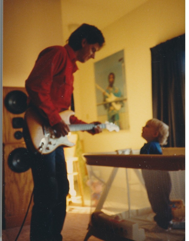 My dad and my baby brother, circa 1989, with Jimi between them.